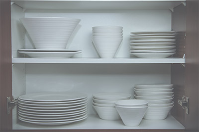 Plates in Kitchen Cupboard